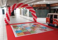 snake and ladder game with a balloon arch